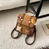 Mochila de Viaje Estilo Británico Primavera/Verano 2026 Mochila Vintage de Nicho Moda Coreana Bolso de Mano para Salir