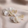 Nova chegada brincos de borla de flor de concha de imitação de zircônia de agulha de prata brincos de luxo leves franceses brincos de moda de alta qualidade