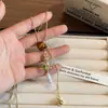 Collar de Perlas con Colgante de Cruz de Piedra Jaspeada Cadena para Suéter de Lujo Ligero Cadena para Clavícula de Diseño de Nicho