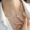 Collar de perlas apiladas de doble capa para mujer, elegante collar de nicho con diseño de alto nivel, cadena de clavícula, nuevas explosiones 2023