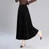 Moderna falda A-line de terciopelo dorado con estampado de leopardo para mujer, nuevo estilo otoño e invierno 2026, falda larga elegante y estilizada, falda acampanada de cintura alta