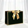 Empaque Lazo de Regalo Personalizado Bolsa de Papel de Mano Bolsa de Compras Lista para Usar Exportación Transfronteriza Impresión de Logotipo Fabricante Envío Gratis