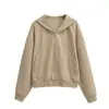 Conjunto de Moletom Cropped com Capuz e Zíper Estilo Coreano Feminino Outono Saia Midi Elástica com Cordão e Fenda nas Costas