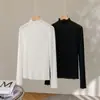 Camiseta base de punto de malla con volantes de encaje estilo francés, cuello medio alto blanco, versátil y ajustada, adecuada para otoño