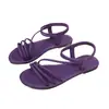 Nuevas Sandalias Planas de Tira Cruzada de Comercio Exterior para Mujer Verano 2026, Pantuflas Cómodas y Ligeras con Textura Metálica