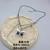 Colar de Borboleta Amor com Letras Pretas Aço Titânio Sem Cor Hip-hop Unissex Acessórios de Nicho Corrente de Lã