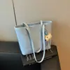 Bolso de hombro grande transfronterizo para mujer, nuevo bolso casual versátil de verano 2026 para llevar debajo del brazo, bolsa de hombro tipo tote para estudiante