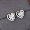 Pendientes Huitan de Metal de Calidad con Forma de Corazón Doble Capa Huecos Exquisitos Pendientes Pequeños de Corazón a Corazón