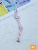Llavero Colgante Creativo Nuevo Transfronterizo Correa de Cuero Color Caramelo Versátil de Moda Accesorio para Bolsa Venta al por Mayor en Stock