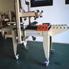 Máquina de Selagem de Fita para Caixas Xinwei Jiayin JPA-500 Tipo Semi-automático com Acionamento Lateral