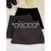 Falda de Lana Gris para Mujer 2025 Otoño e Invierno Nuevo Estilo Negra de Cintura Alta Versátil Corta de Corte A para Figuras Pequeñas