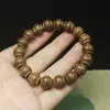 Cuentas de linterna de madera 12 mm pulsera pulsera estilo nacional simple joyería para hombres y mujeres Wen juega cuentas de Buda cuentas de rosario al por mayor