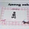 Lindos Dibujos Animados Galleta con Goteo de Aceite Oso Perro Luna Gato Kt Oreja de Oso de Lazo Uña de Hueso Pendientes de Acero de Titanio para Mujer