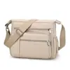 Moda Transfronteriza Simple Bolso Pequeño Cuadrado de Tela de Nylon Repelente al Agua con Múltiples Compartimentos y Correa para el Hombro Bolso Cruzado para Mujer Nuevo 2025