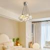 Lámpara de diseño de estilo nórdico para sala de estar, moderna, sencilla, creativa, con bloques de hielo de piedra, lámpara de comedor personalizada, lámpara de dormitorio color crema.