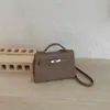 Comércio Exterior Atacado Alta Qualidade Popular Bolsa Estilo Coreano Moda Versátil Bolsa de Ombro Único Design de Nicho Pequena Bolsa Quadrada de Alta Qualidade