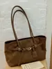 Bolso de mano de nicho muy elegante y casual estilo coreano, nuevo 2026 vintage color liso bolso relajado para el hombro y debajo del brazo