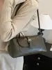 Bolsa baguette de nicho super popular para outono e inverno, novo estilo 2026 para mulheres, bolsa de ombro única/sob o braço da moda para o trabalho, bolsa de mão para atividades ao ar livre