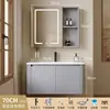 Tocador de baño engrosado y ahorrador de espacio con diseño en color crema, que cuenta con un lavabo redondeado, lavabo cerámico integrado y un lavabo de una sola pieza.