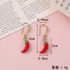 Colgante metálico de chile pequeño, vivo y vibrante, llavero de chile auspicioso y de la suerte, accesorio lindo de nicho al por mayor