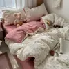 Nuevo modelo 2026 juego de ropa de cama de cuatro piezas de algodón lavado con diseño de jacquard teñido en hilo fresco y simple, adecuado para dormitorios de estudiantes y lavable a máquina