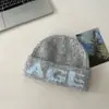Gorro de Punto con Letra Retro Coreano de Comercio Exterior 2025 Nuevo para Mujer Invierno Cálido Holgado Versátil Protección para Orejas Gorro de Lana