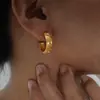 Pendientes y Pulsera con Patrón de Estrella y Luna en Relieve de Lujo Nicho Incrustados con Circonita Todo-partido para Traje de Mujer Joyería Sin Color Transfronteriza