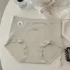 Nueva ropa interior femenina de cintura alta con micro-presión, hecha de algodón puro, cómoda y transpirable, antibacteriana 10A, con un panel frontal extendido y diseño de tiro bajo en forma de escudo