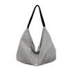 Bolso de axila de moda estilo coreano transfronterizo para mujer, bolso de hombro casual a rayas, bolso de mano de gran capacidad simple y artístico estilo bosque
