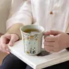 Taza de Té de Cerámica con Tapa y Separación de Té y Agua para Uso en la Oficina, con un Logo Festivo de Regalo con un Diseño de Ceniza de Hierba, Caqui y Panda
