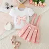 Conjunto de dos piezas de verano para niñas: Conjunto Infantil de Falda Plisada con Tirante de Lazo 3D y Camiseta Estampada de Manga Corta