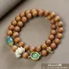 Pulseira de contas de oração budista de madeira crua natural, vendida a quente, sândalo dourado, sândalo Barbie, pulseira colecionável para homens e mulheres, fornecimento para live-stream