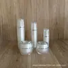 Botella de crema acrílica de 30g Botella secundaria de crema hidratante tipo perla 50ml Botella pulverizadora de loción base correctora