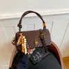 Bolso casual Shuai Mi Jia para mujer, nuevo modelo otoño 2026, bolso cuadrado pequeño simple y elegante, bolso cruzado de moda