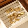 Pendientes de amor huecos de acero inoxidable europeos y americanos, personalidad femenina, pendientes de metal con forma de corazón de temperamento simple retro para mujer