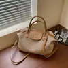 Bolso de mano de paja versátil de moda transfronterizo para mujer, nuevo bolso de hombro cruzado de gran capacidad informal para el verano de 2026