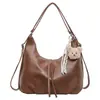 Mochila Casual Texturizada de Gran Capacidad Otoño 2026 Nueva Elegante Bolso Cruzado de Hombro Único Retro Popular de Moda