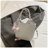 Bolso de mano elegante de moda nuevo para principios de otoño de 2026, bolso cruzado de nicho, bolso de hombro fresco estilo cesta de lunares