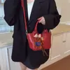 Bolsas Femininas da Moda para Este Ano: Elegante Retrô Textura Simples Versátil Bolsa de Mão Saco de Balde para o Trabalho Nicho Elegante Bolsa Transversal