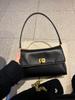 Bolso de Mujer Cuero Genuino Nicho de Alta Gama Cadena Bolso de Axila para Mujer Commuter 2025 Nueva Llegada Bolso de Hombro Cruzado Moda Combinable
