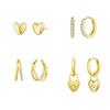 Conjunto de cuatro pendientes bonitos para mujer con colgante de amor de circonita electrochapada de latón dorado auténtico de gran venta transfronteriza europea y americana