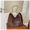Bolsa de mão transfronteiriça estilo coreano com estampa de leopardo para mulheres, bolsa de ombro acolchoada de cor sólida, estilo de luxo leve e requintado, bolsa transversal versátil