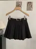 Falda plisada de cintura alta estilo preppy Omalai 2026 Primavera y Verano Falda corta con cinturón para mujeres petite 6959