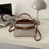 Bolso de Mano para Mujer Estilo Retro Hebilla de Cierre Mate Bolso Cuadrado Pequeño Nuevo Estilo 2026 Bolso de Hombro Único Bolso Cruzado Estilo Coreano Bolso para Teléfono Móvil de Viaje