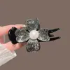 Grampo de Cabelo Coque Bola Feminino Simples de Luxo Elástico de Rabo de Cavalo Elegante Versátil Exquisite Grampo Acessórios de Cabelo Feminino Pérola Trevo