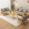Sofá sala de estar 2026 nueva combinación mesa de centro moderna simple casa de alquiler apartamento pequeño sofá de madera maciza doble tela