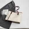 Bolso de gran capacidad de comercio exterior para mujer, primavera y verano 2025, nuevo bolso de hombro portátil a juego, bolso de mano de clase para ir al trabajo.