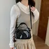 Bolso de moda para mujer 2026 nuevo estilo versión coreana artículo de moda popular bolso cuadrado pequeño versátil sensación nicho bolso cruzado minimalista