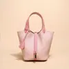2025 Nova Camada Superior Couro Bovino Padrão Lichia Cor Sólida Bolsa Cesta de Vegetais Grande Capacidade para o Dia a Dia Bolsa de Mão de Couro Genuíno Bolsa Saco