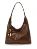 Bolso de Lona Retro de Gran Capacidad para Salir y Viajar 2026 Nuevo Elegante Casual Color Sólido Debajo del Brazo Diseño de Moda Bolso de Hombro